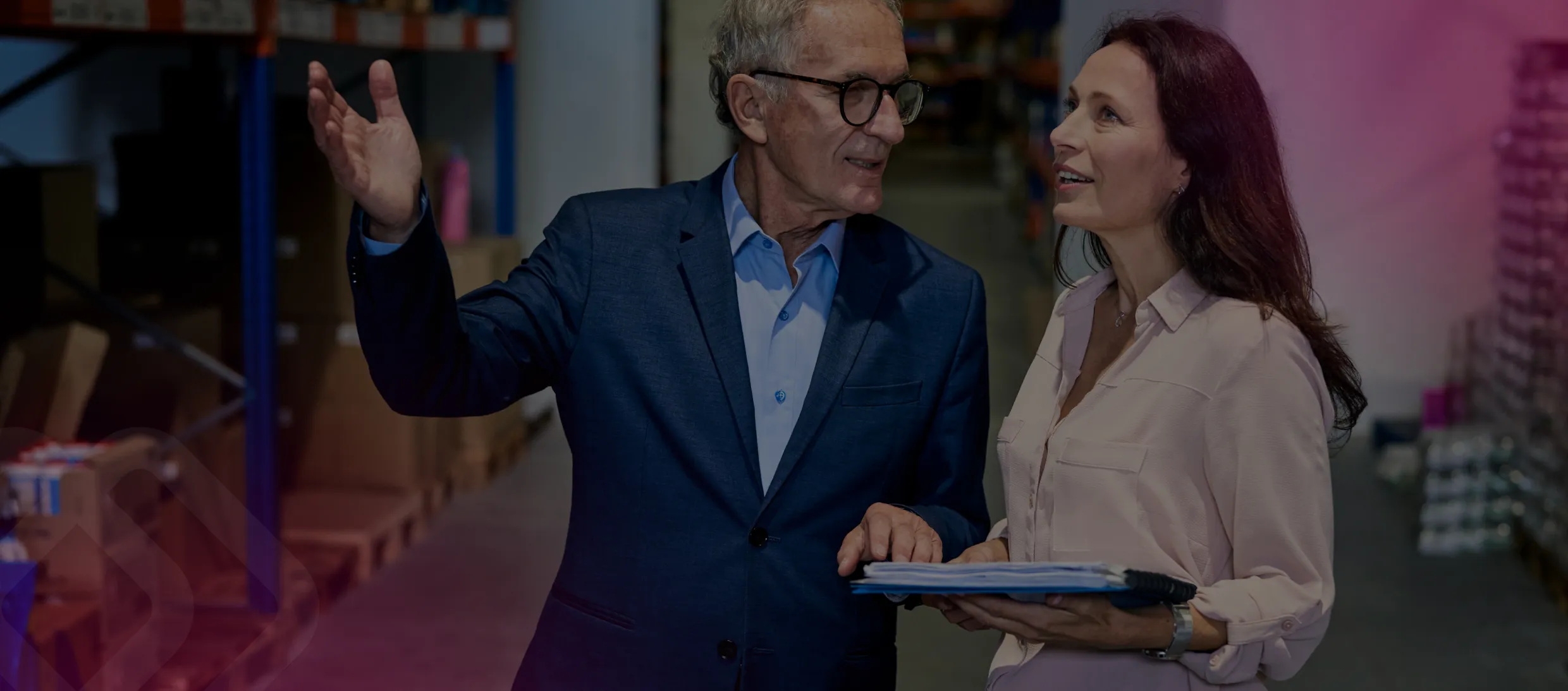Two businesspeople talking in a store