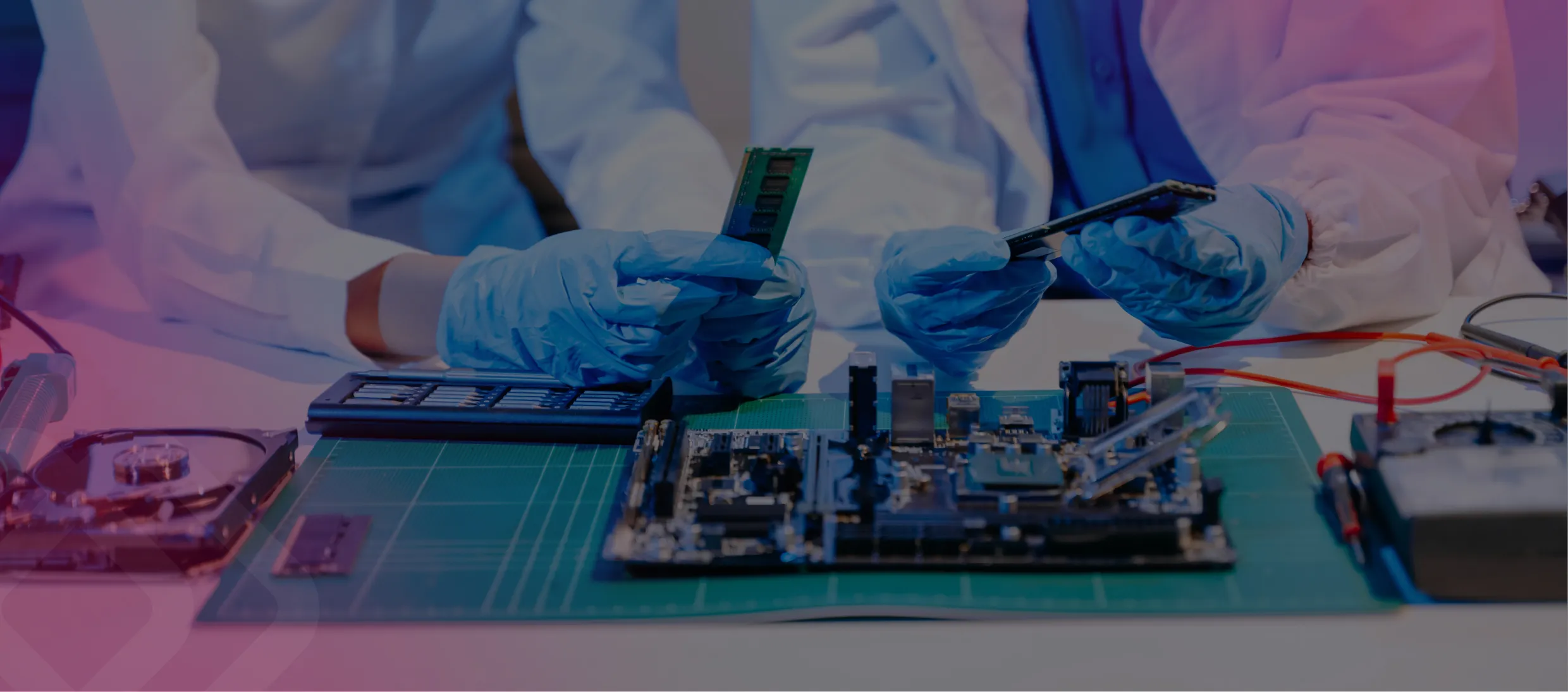 Hands assembling a circuit board