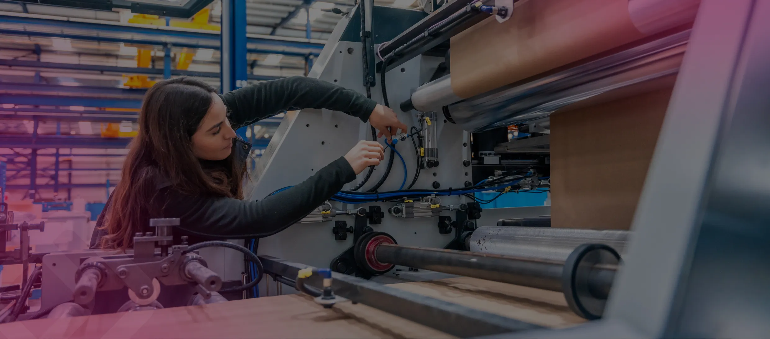 Worker operating a production machine
