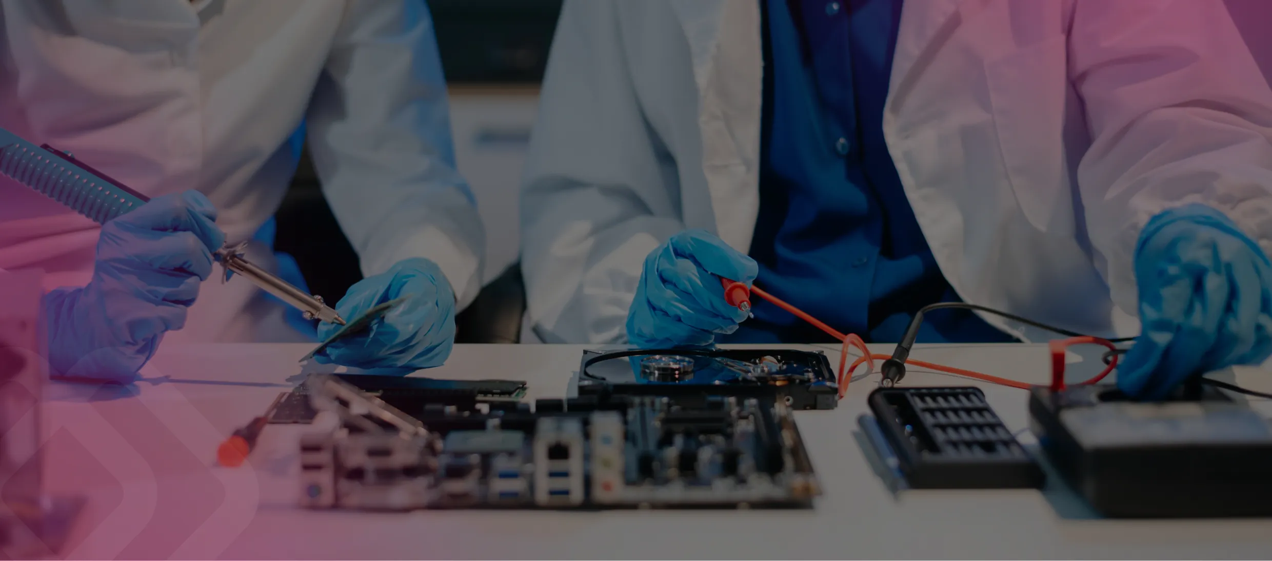 Technicians assembling electronics