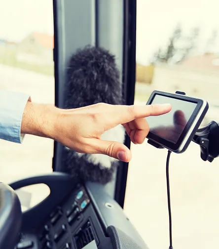 Hand using a mounted tablet in a vehicle cab