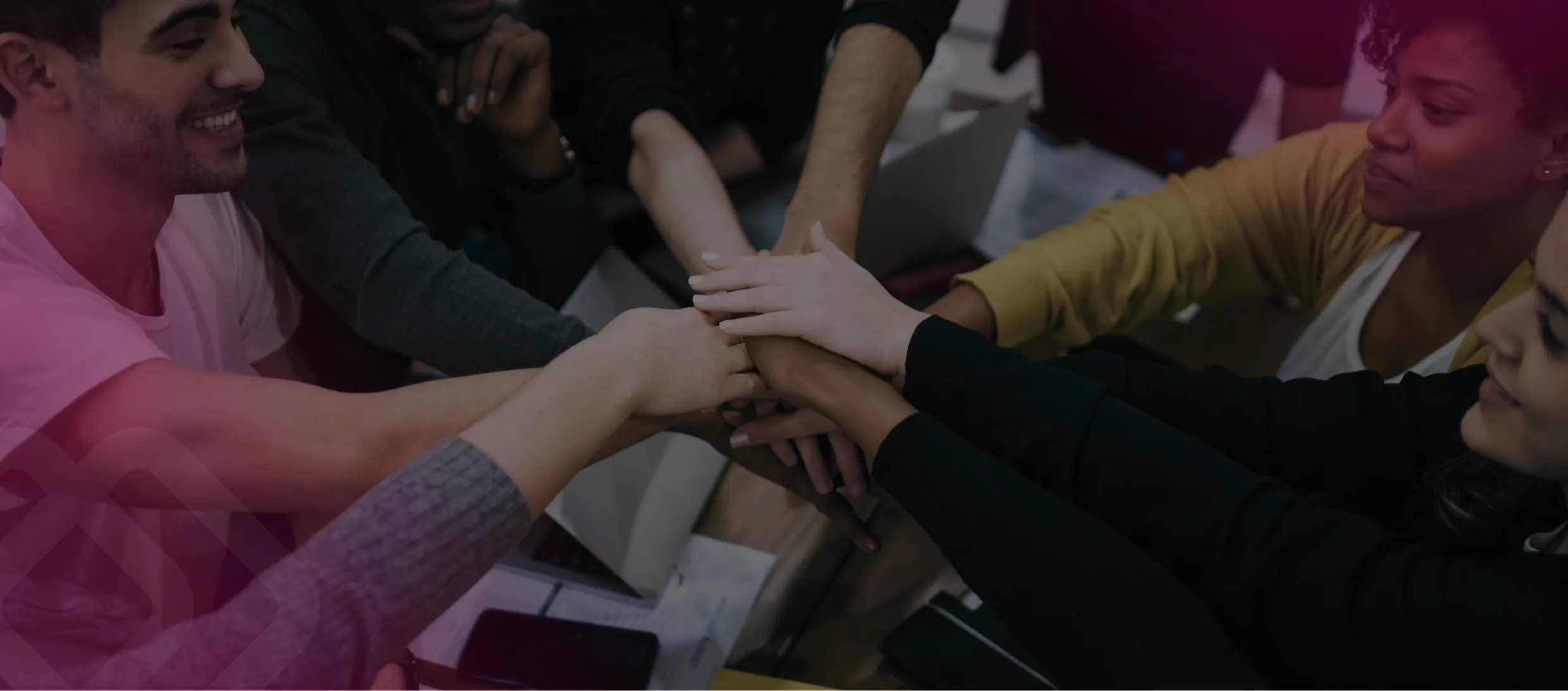 Team putting their hands together