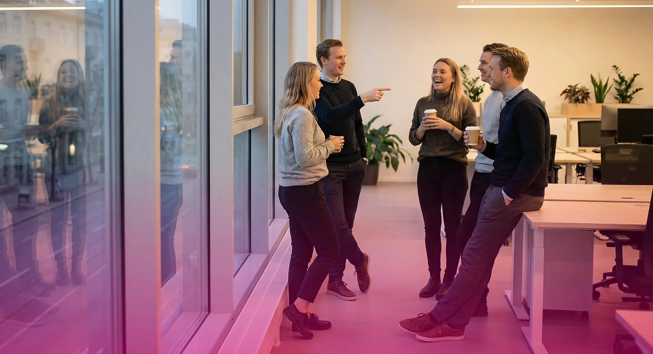 Colleagues chatting in an office