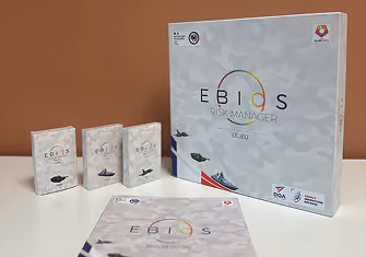 Boîte du jeu EBIOS Risk Manager avec ses extensions et son livret scénario