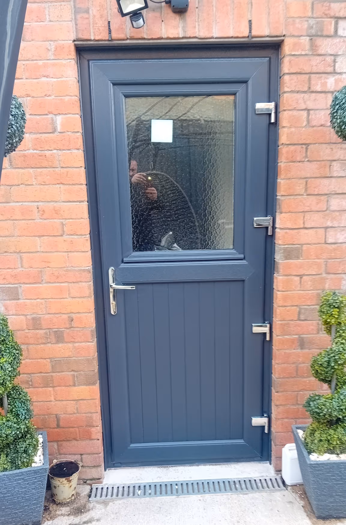 Anthracite grey uPVC side door fitted with frosted glass panel