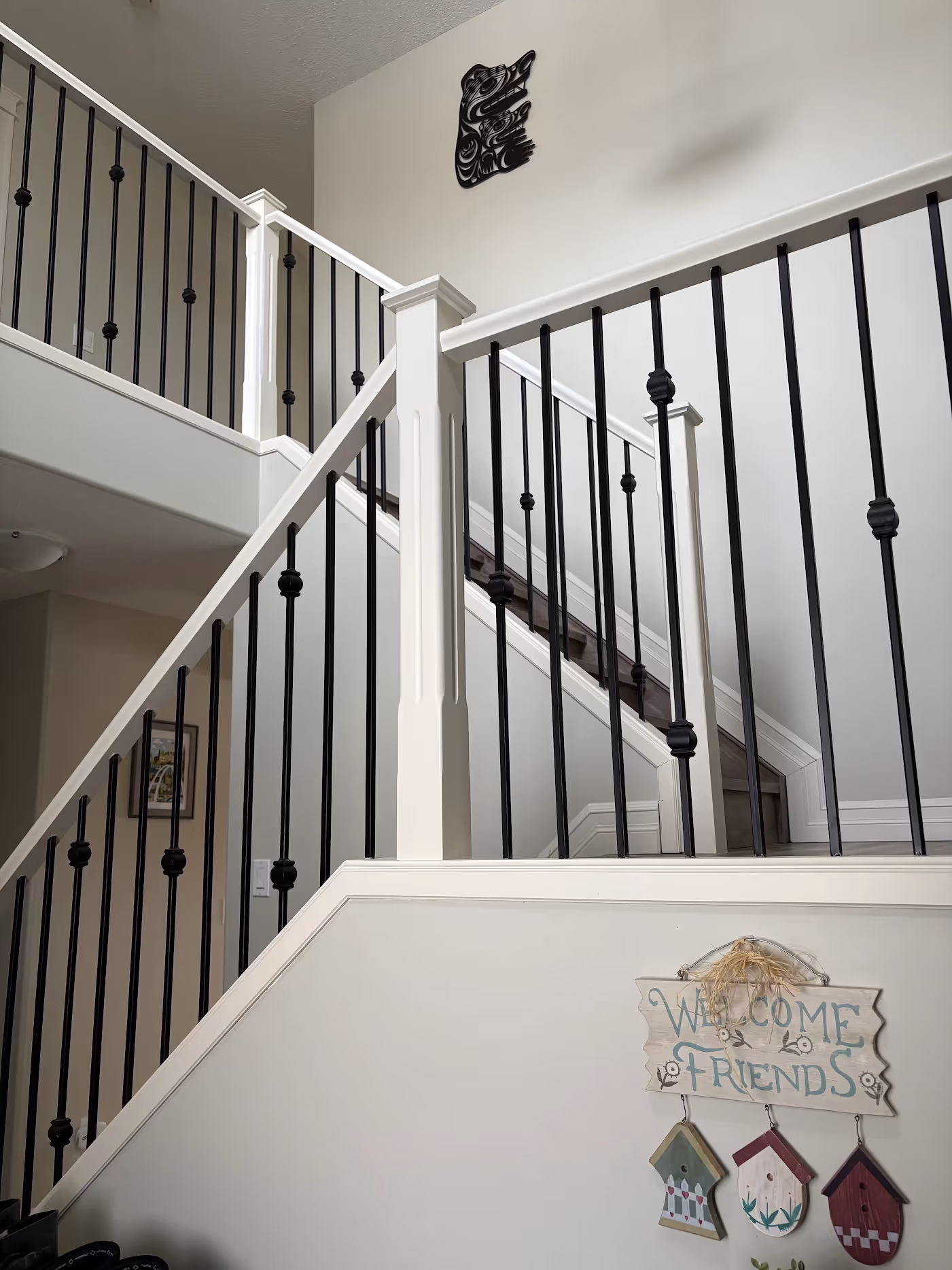 Residential Interior painting of a railing and walls by C&C Painting in Erin Ridge, client photo