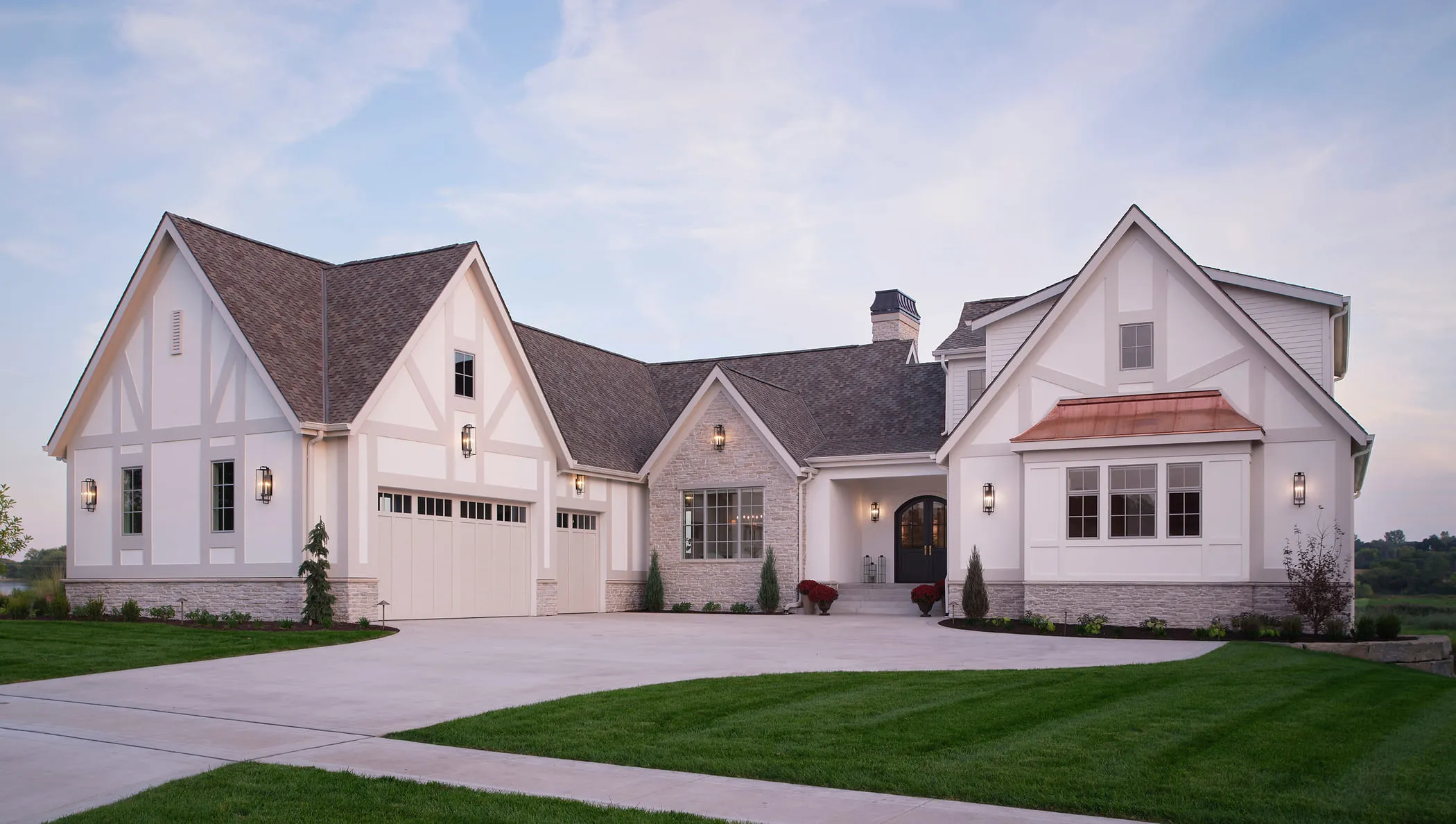 A large white house with a red roof.