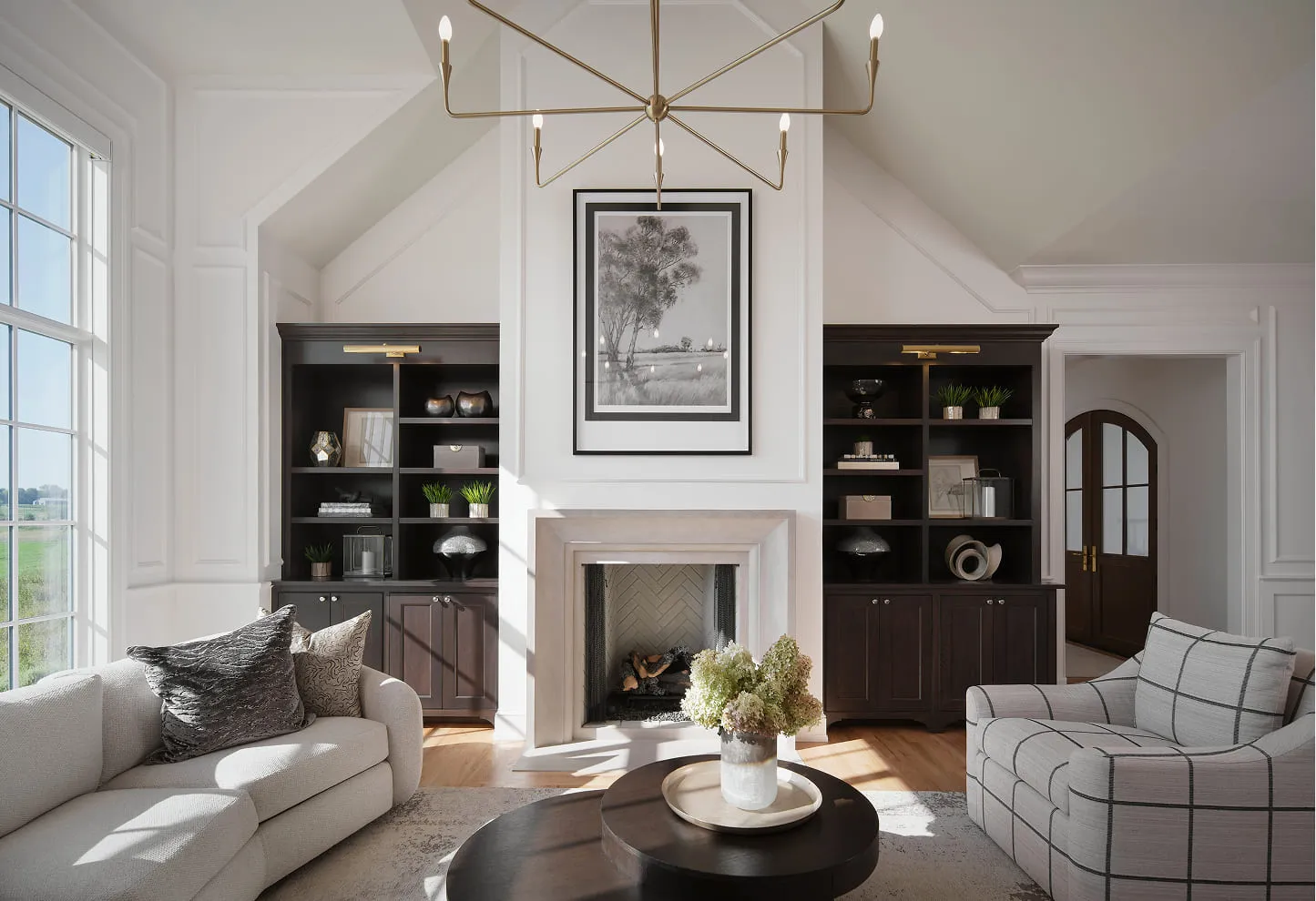 A living room filled with furniture and a fire place.