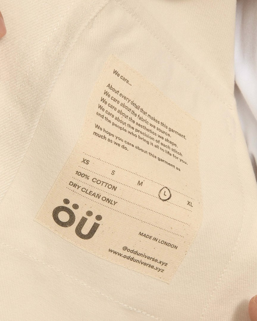 Odd Universe kraft paper pouch with the ou monogram label