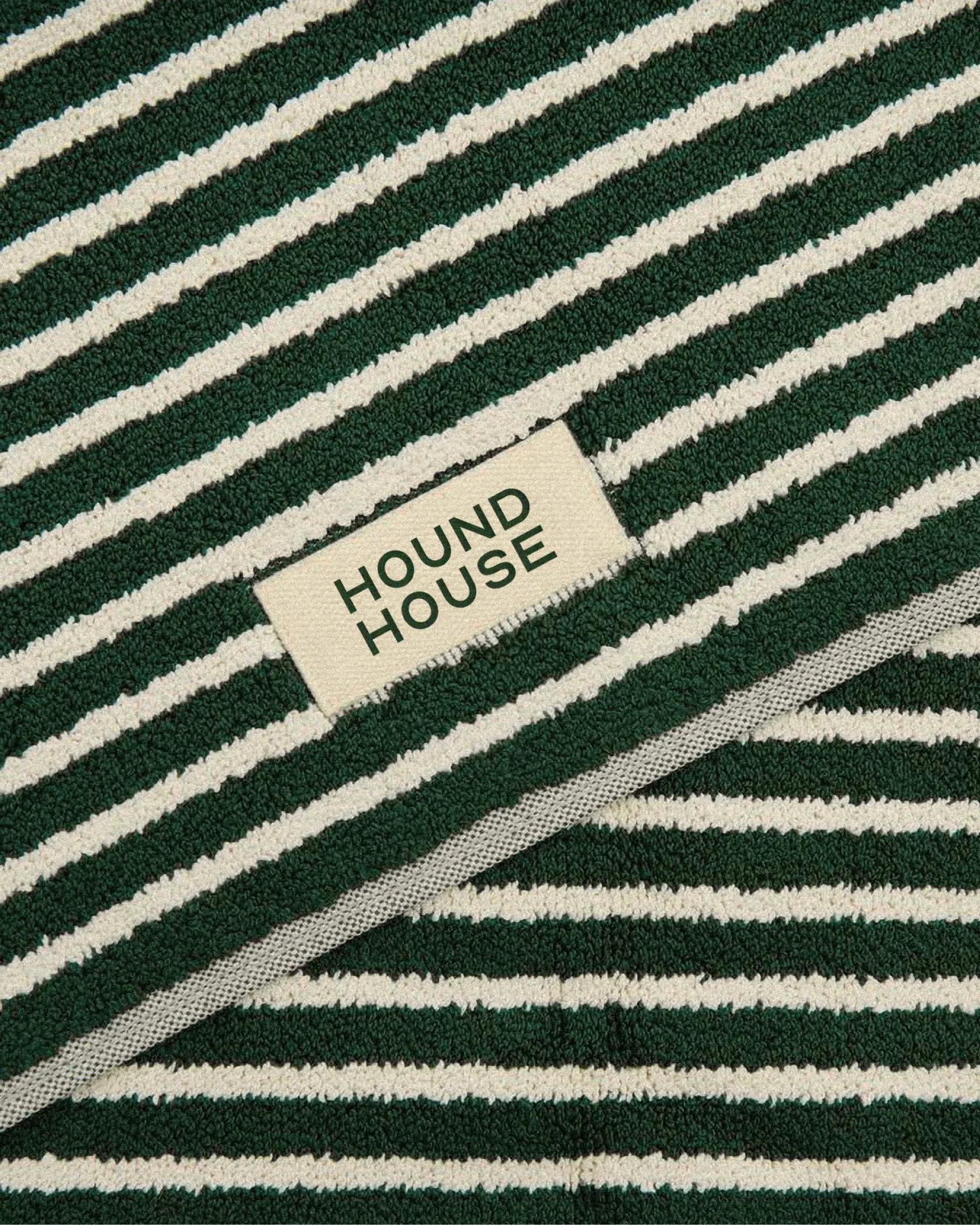 Hound House dark green striped towel with the woven wordmark