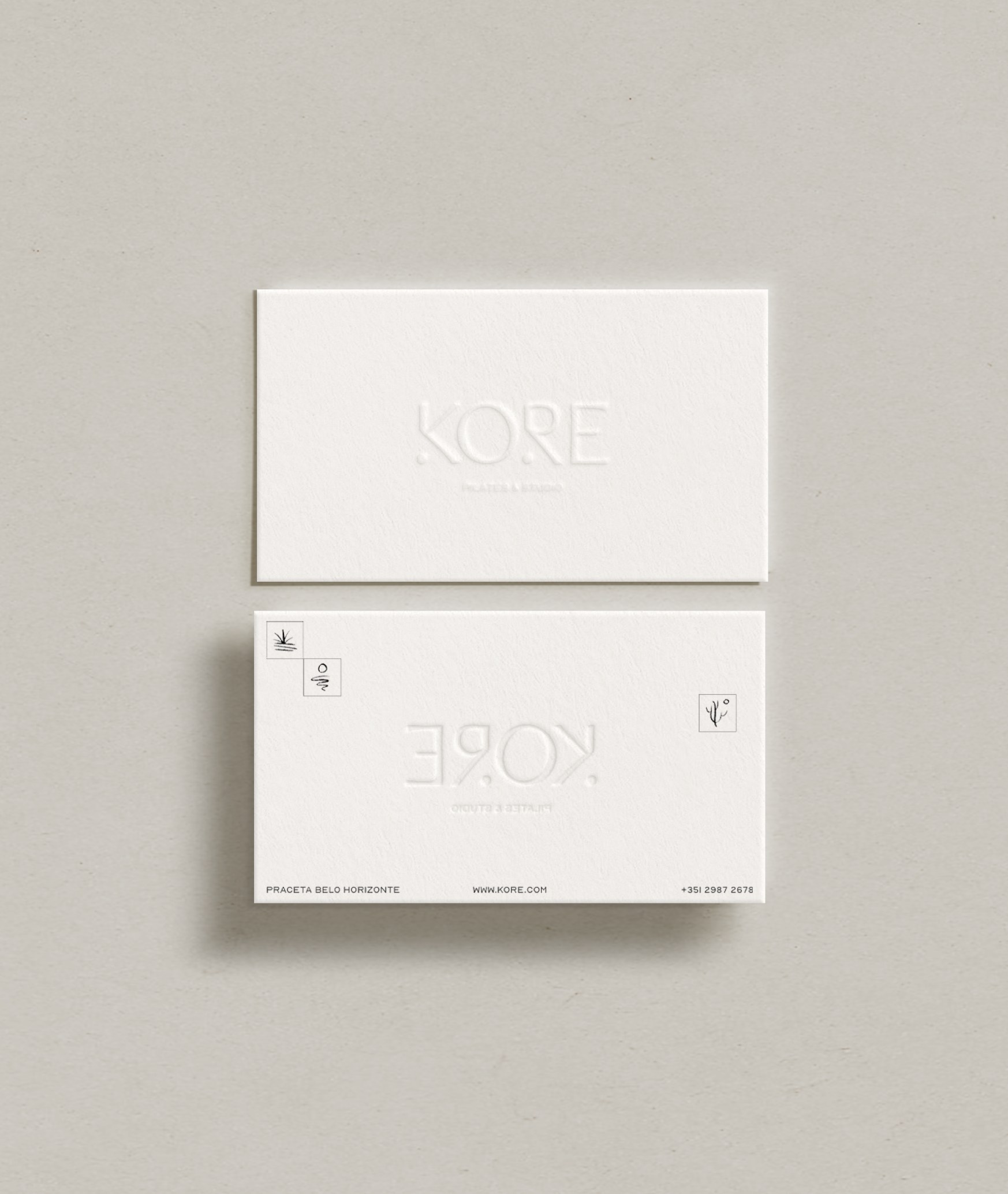 Kore Pilates folded stationery card mockup in soft neutral tones