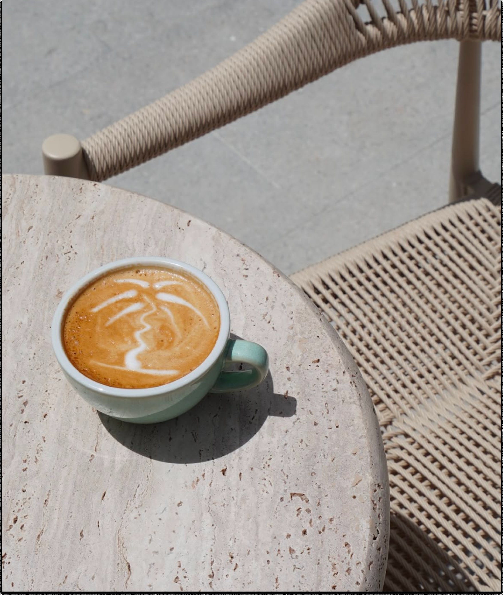 Kore Pilates café flat white coffee on a table, lifestyle photography