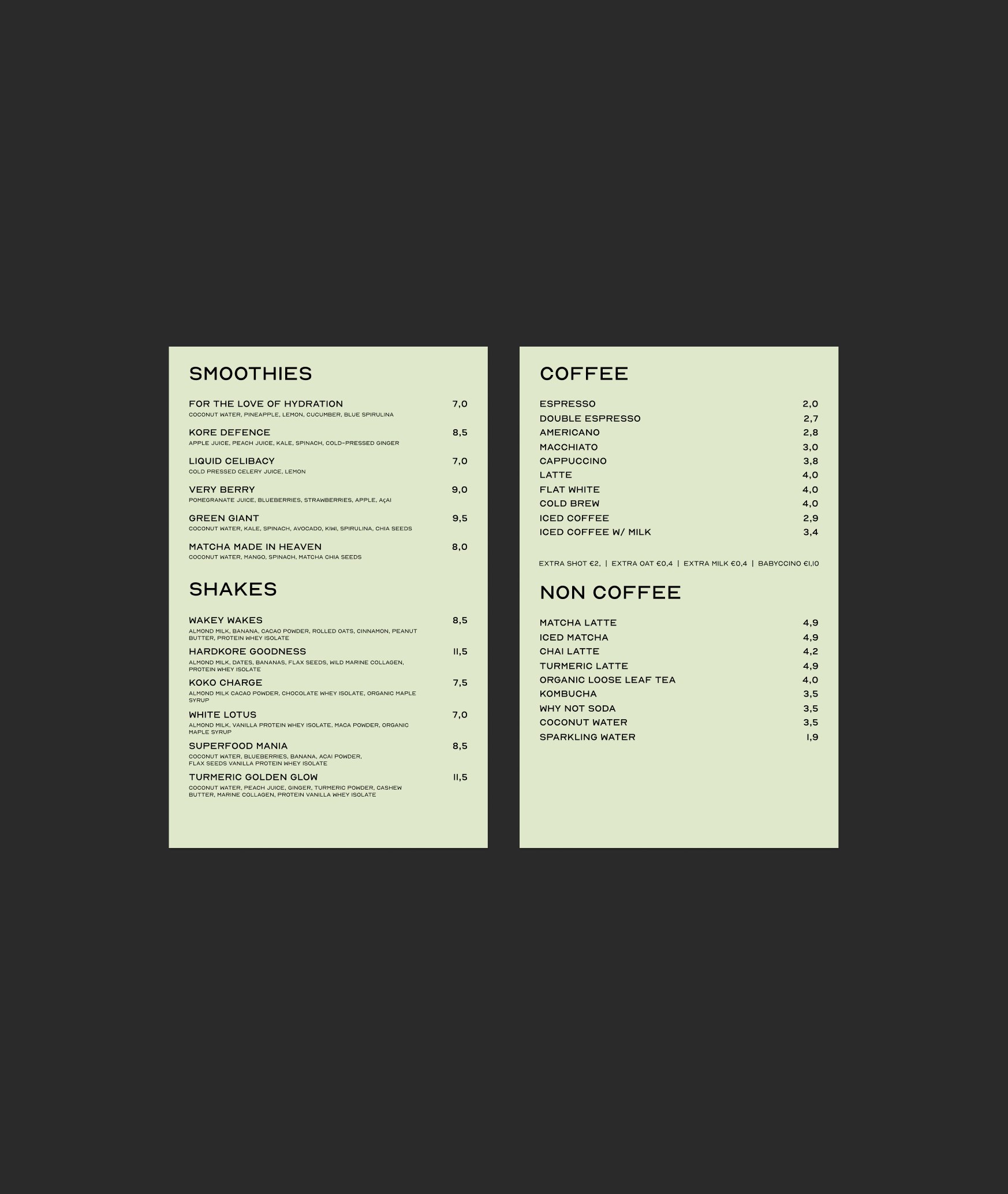 Kore Pilates café menu board in black listing smoothies and coffee in the brand type