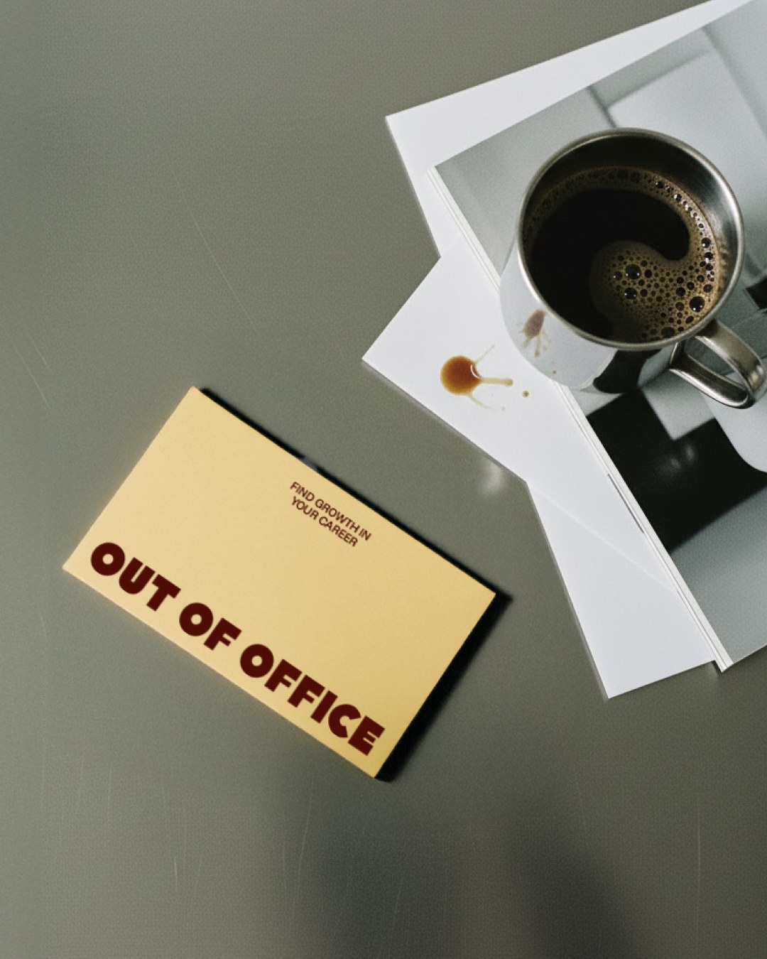 Out of Office business cards mockup on a table in the brand's warm palette