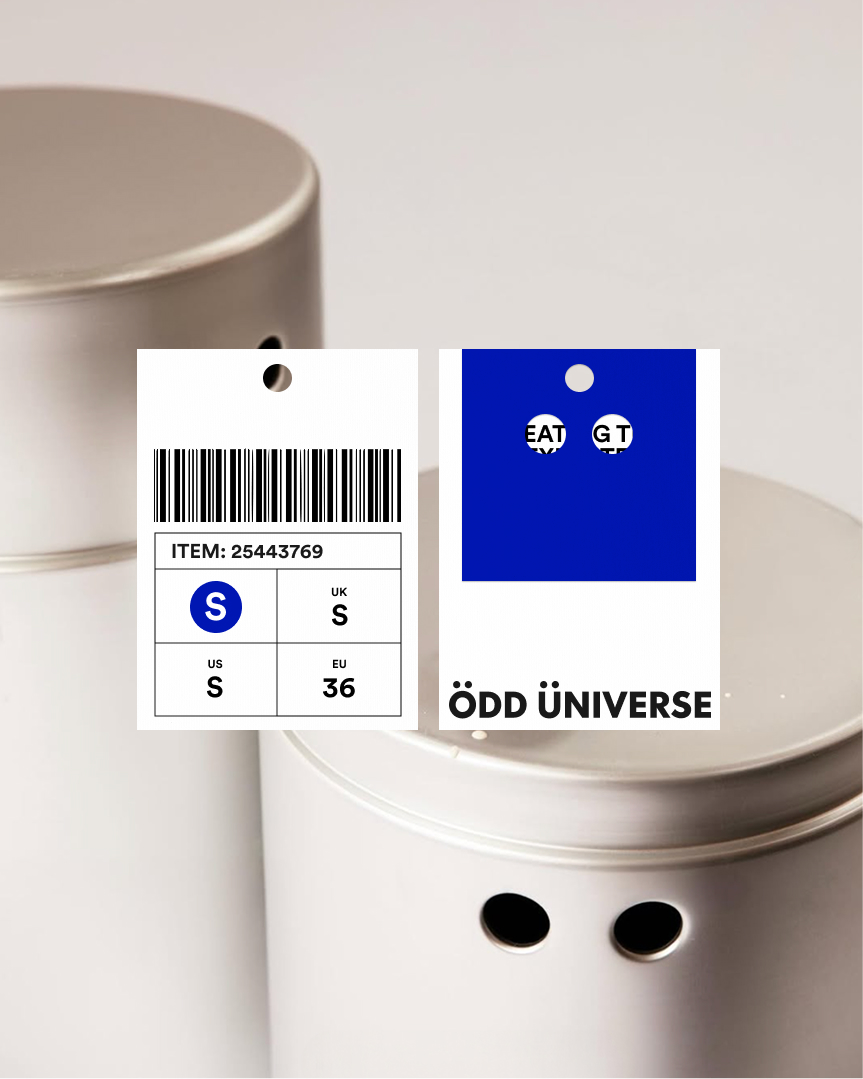 Odd Universe product packaging with branded swing tag and eyes motif