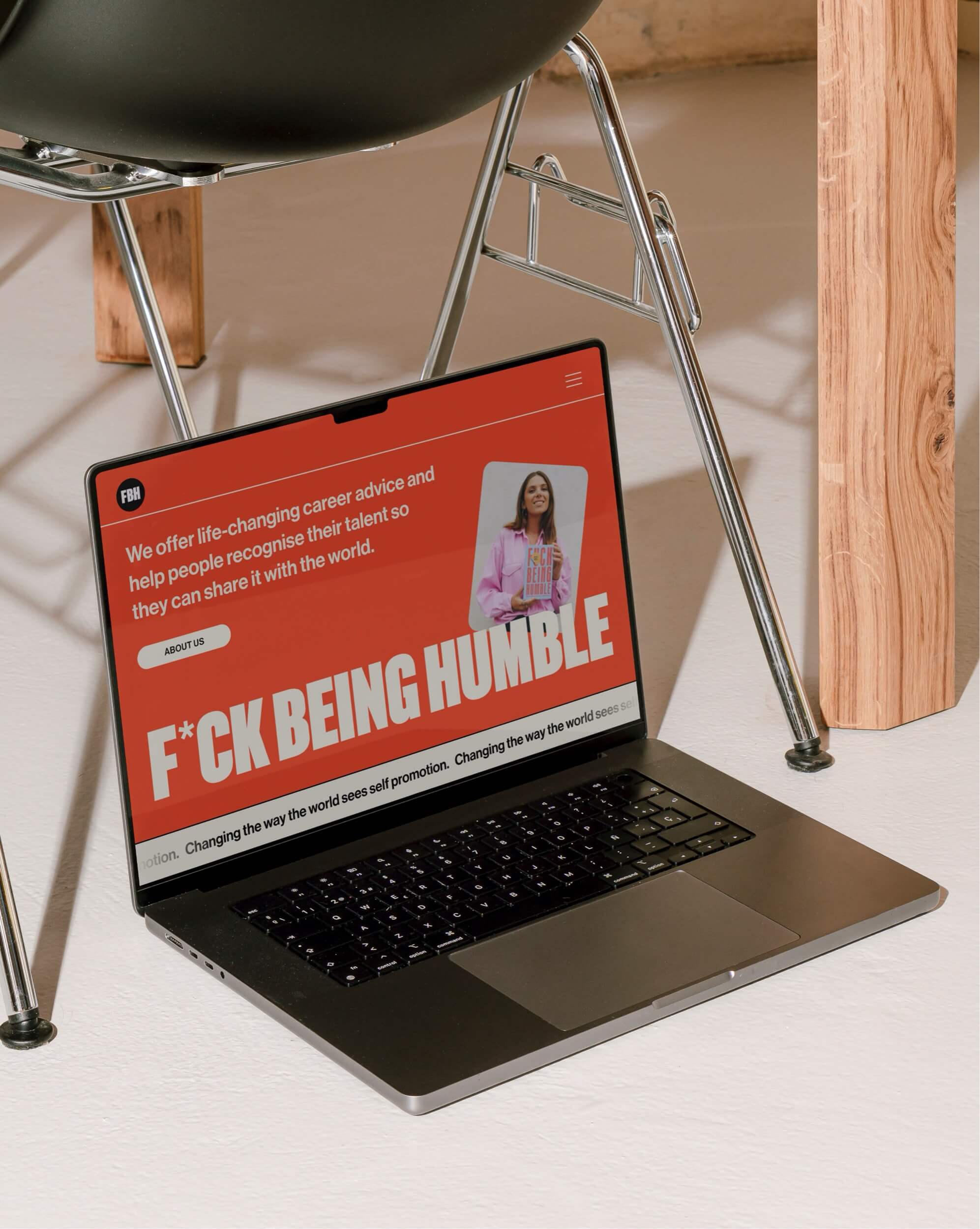 Fuck Being Humble website designed by Maybe Design Studio shown on a laptop