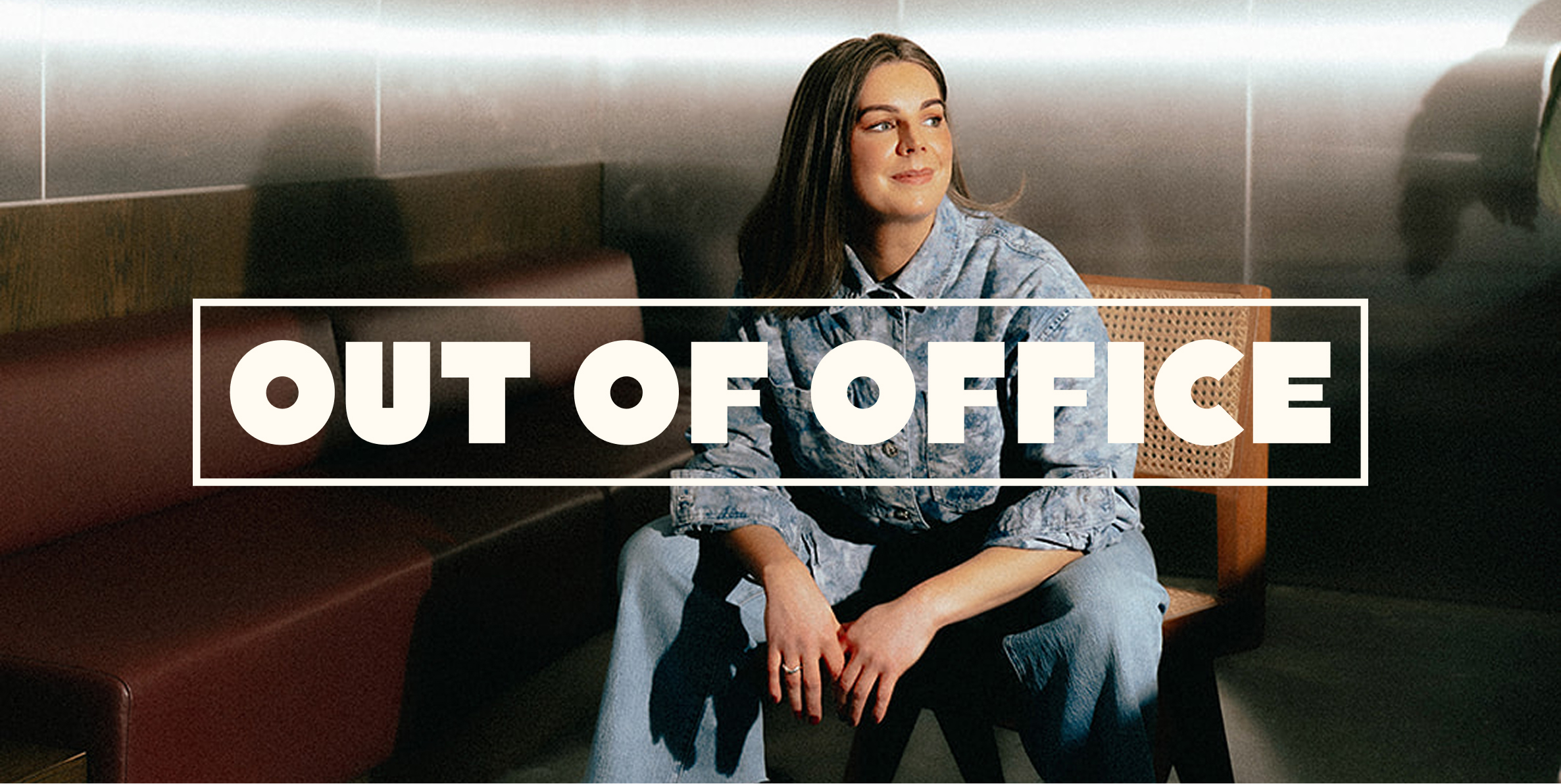 Out Of Office logo over a portrait of the founder seated in a bar booth