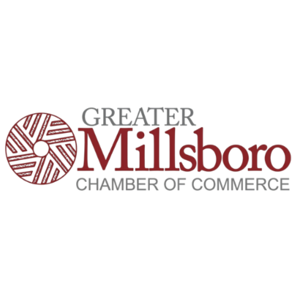 Logo of Greater Millsboro Chamber of Commerce with a circular red design on the left and text on the right.
