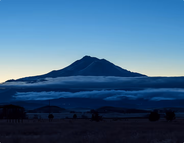 clouds passing quickly around Mount Shasta