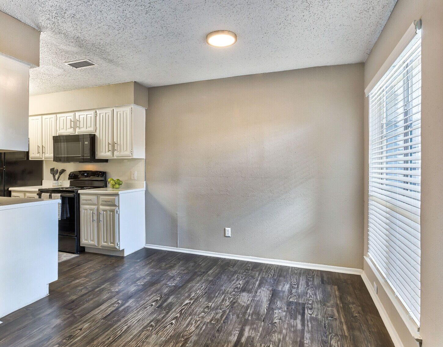 Dining room at Spring Creek Apartments in Richardson, Texas