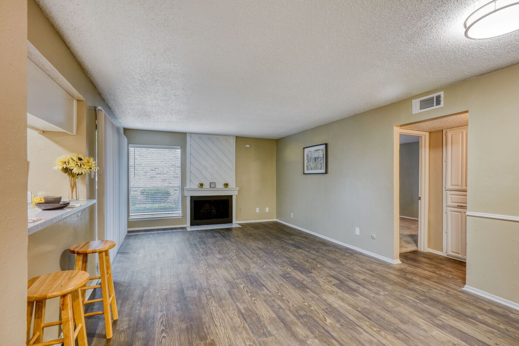 Living room at Spring Creek Apartments in Richardson, Texas