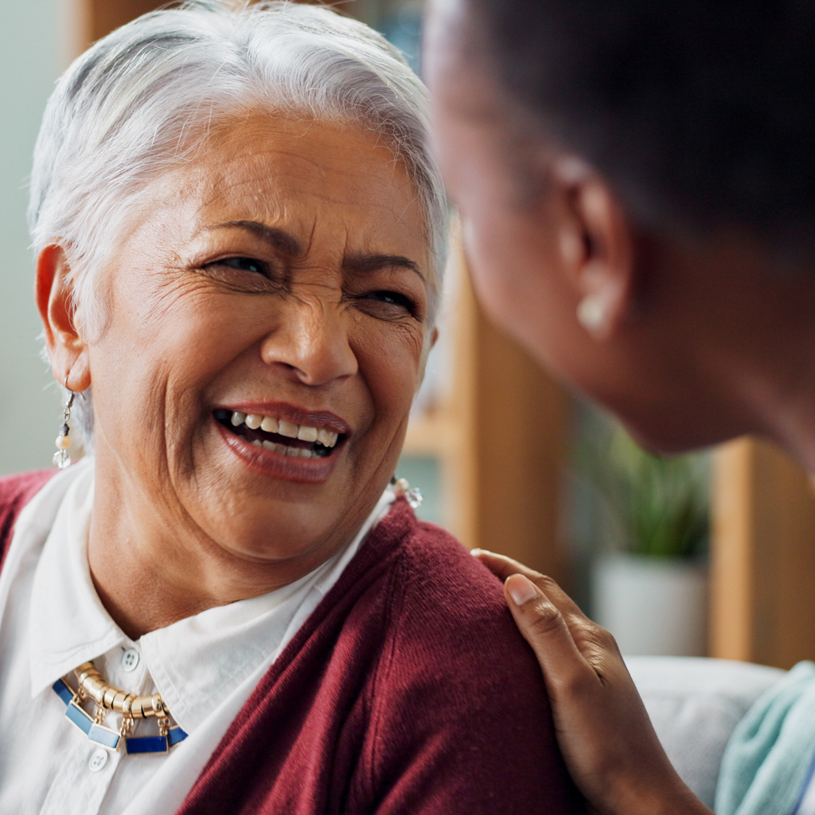 Nurse reviewing information with an older patient