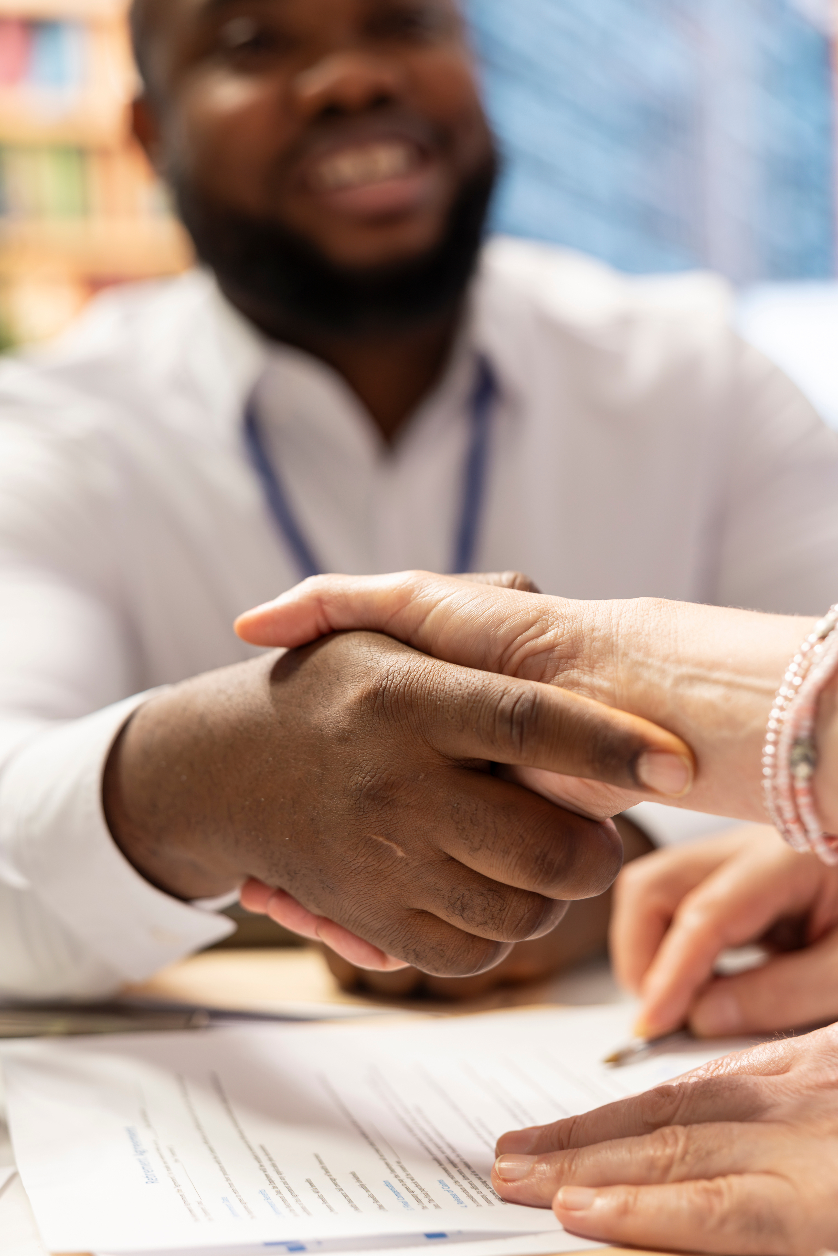 Doctor and patient shaking hands
