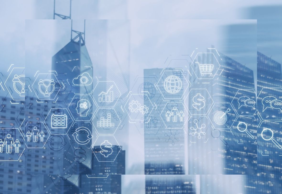 City skyscrapers with overlay of hexagonal icons representing business and technology concepts.