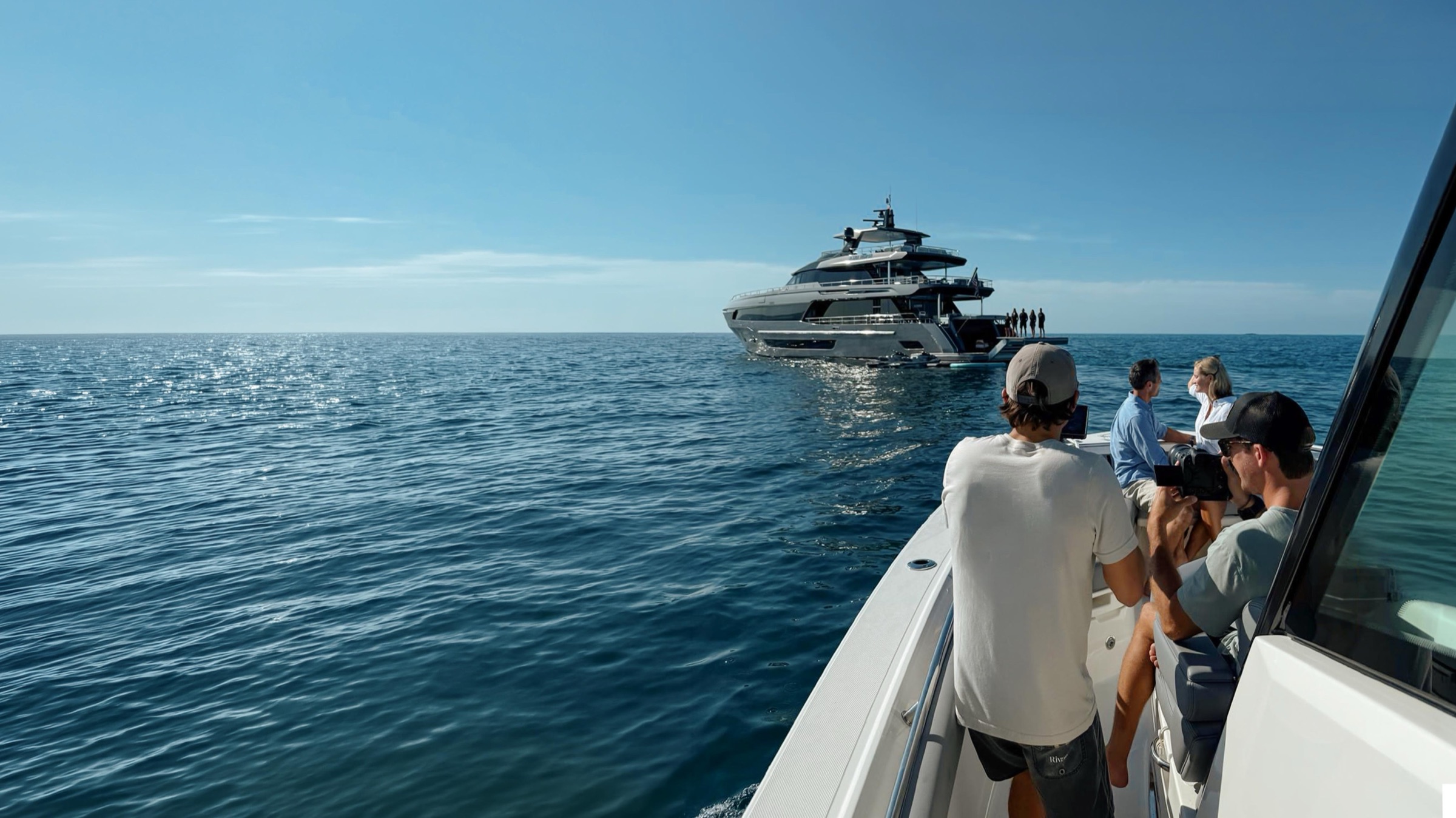 Shooting a motor yacht from the chase boat