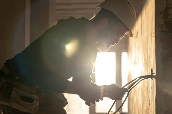 Electrician is working