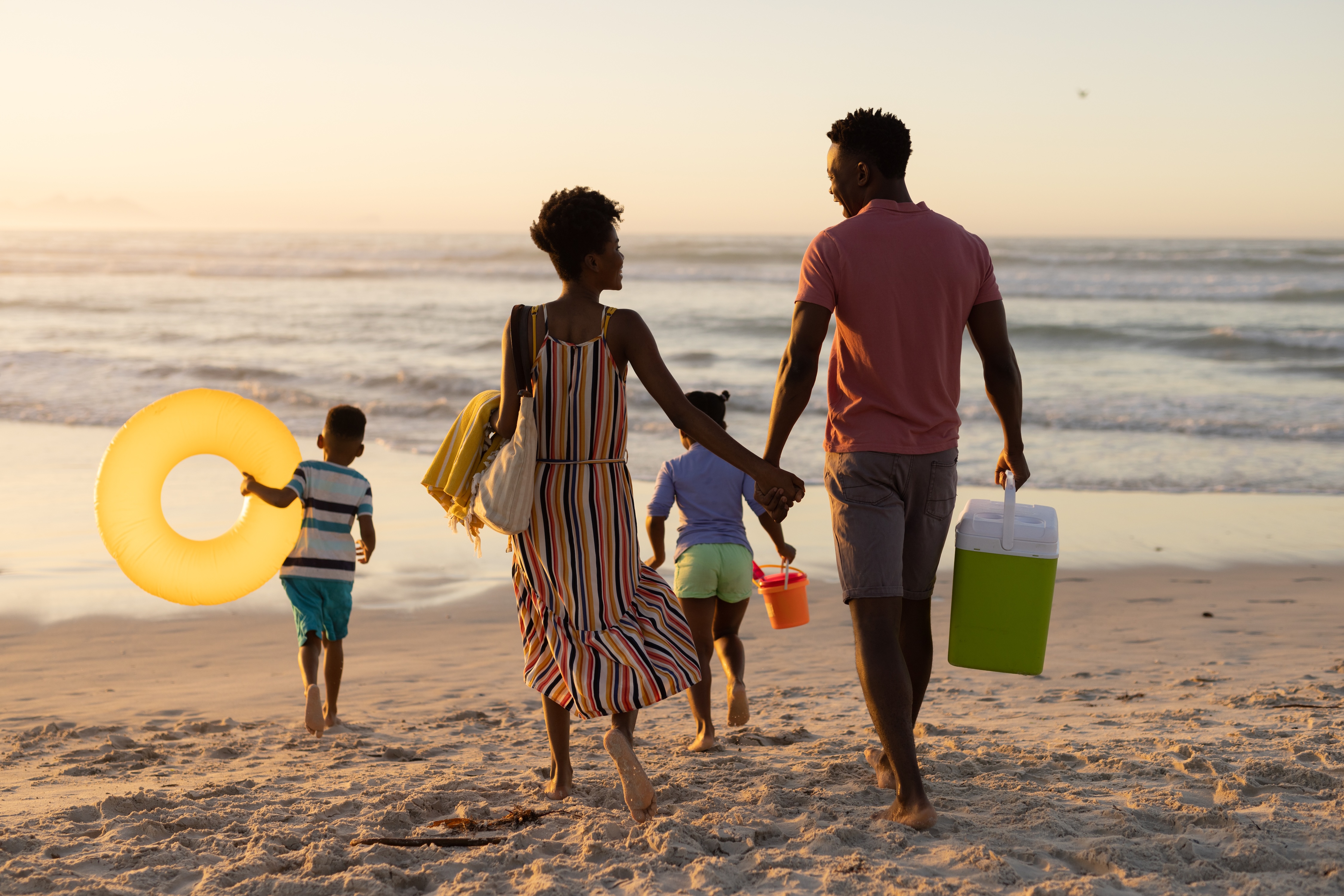 Family going to the beach stock image