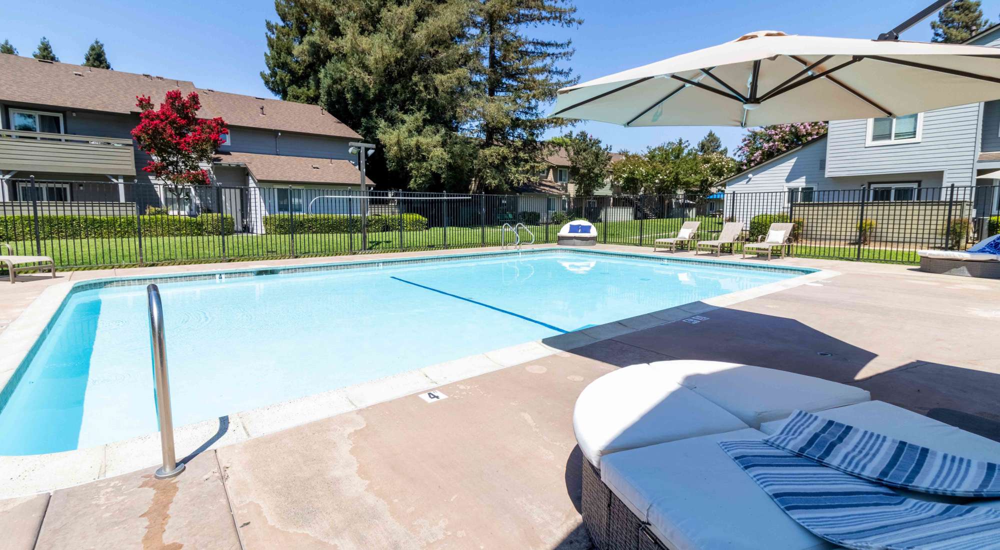 Swimming pool with lounge chairs