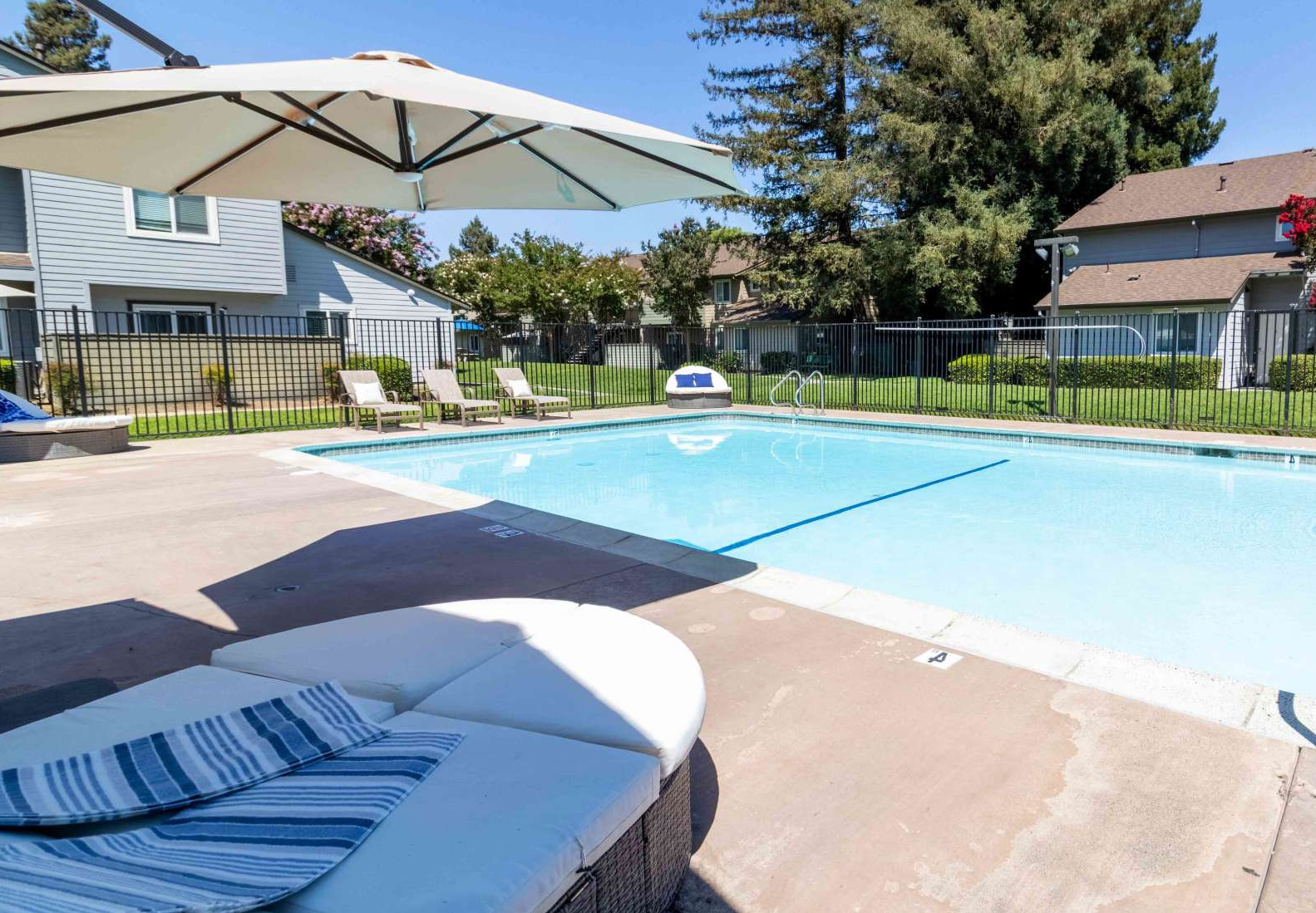 Swimming pool with lounge chairs