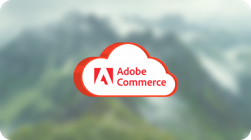 Adobe Commerce logo inside a red and white cloud shape over a blurred mountain background.