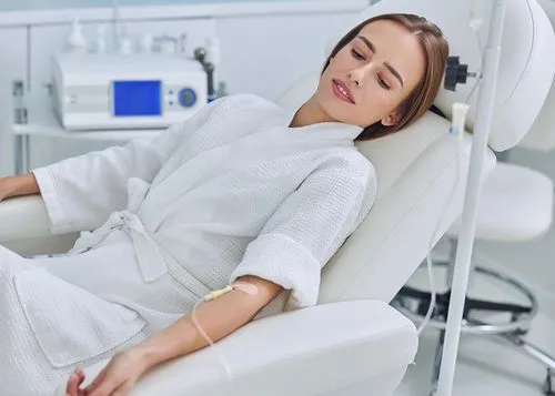A woman getting IV therapy