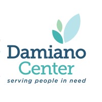 Damiano Center logo with blue and green leaves and tagline serving people in need.
