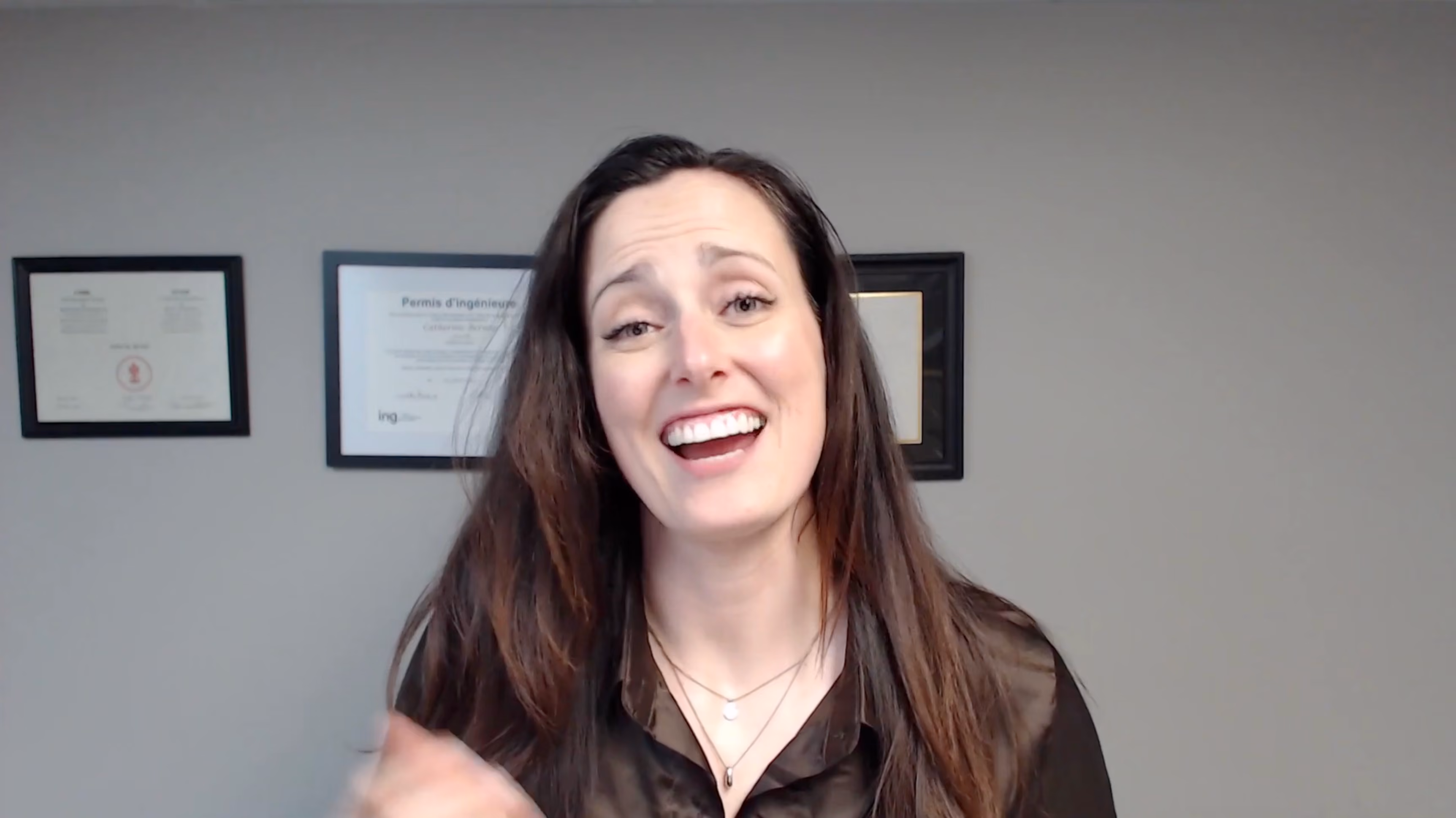 Catherine Bernier, founder of Content for Cobots in in front of certifications