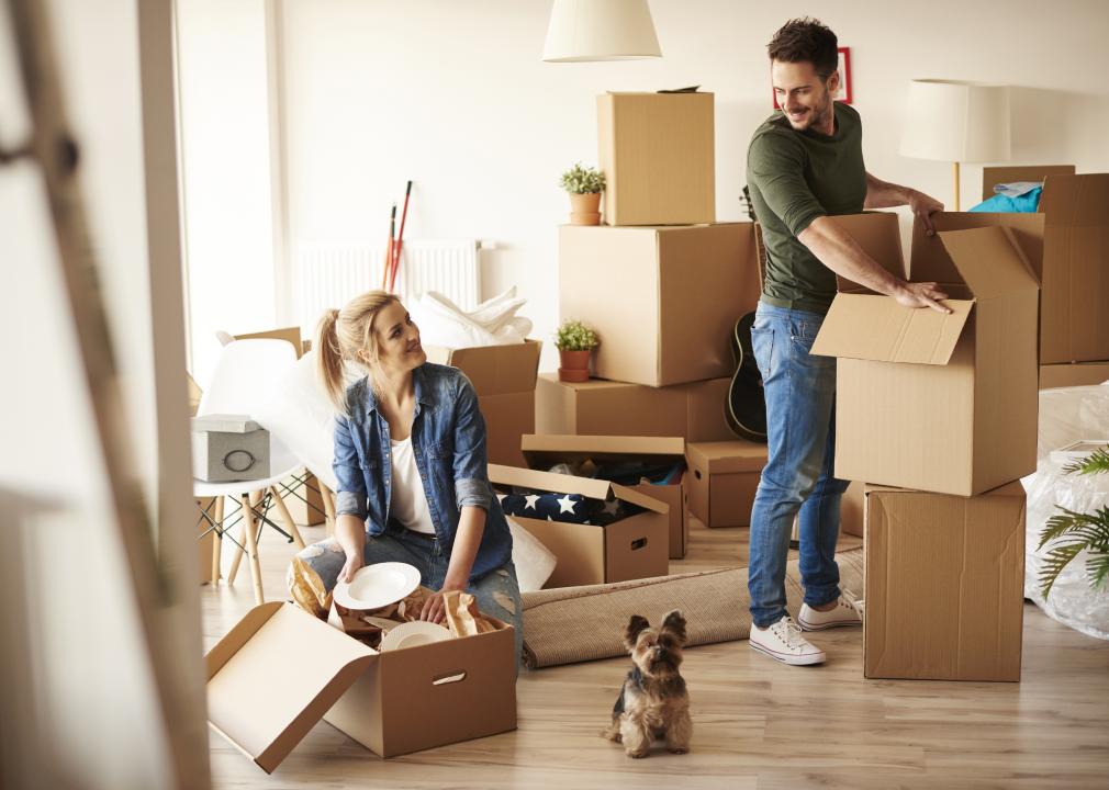 Couple packing boxes