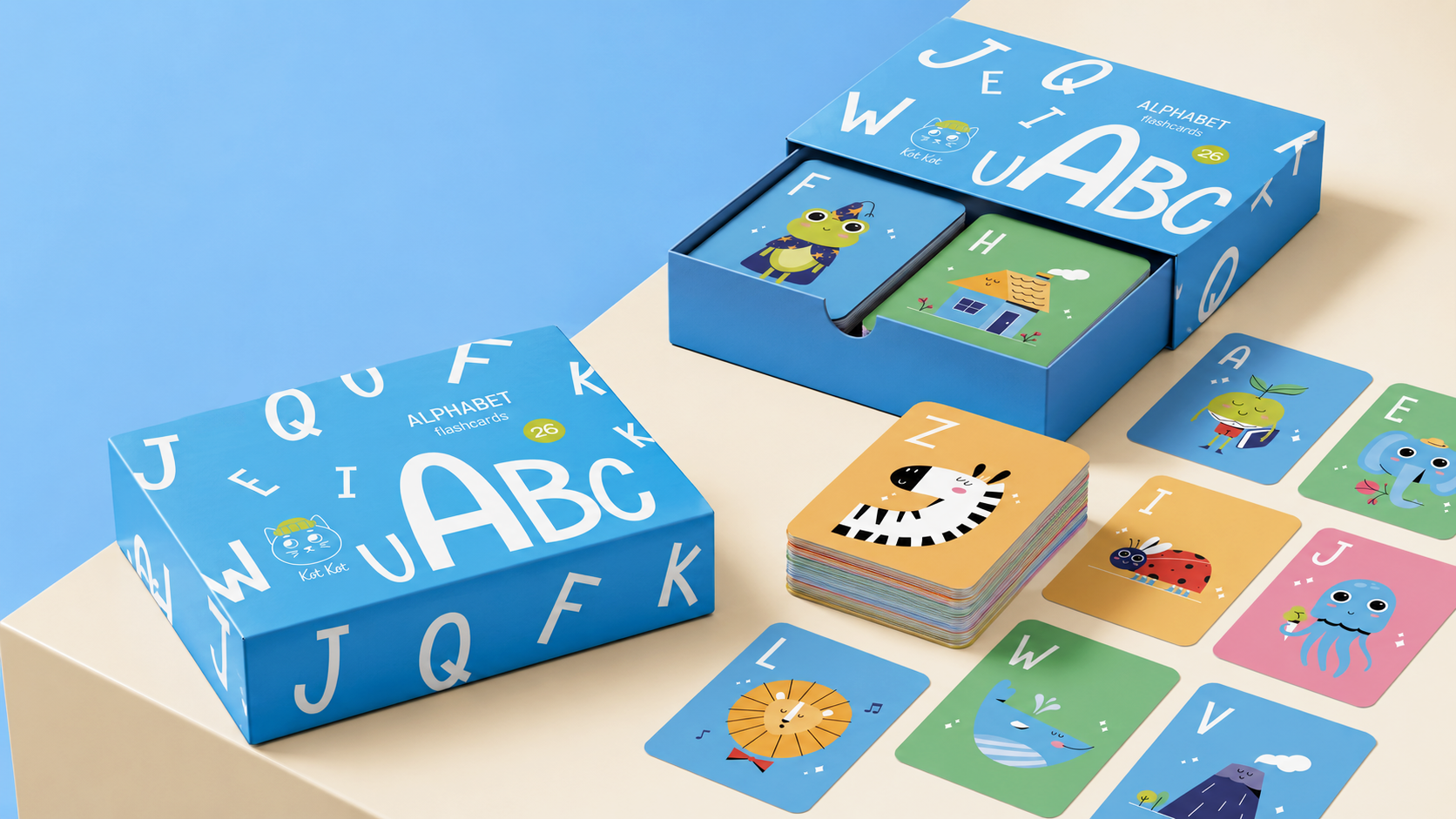 Colorful alphabet flashcards with animal and object illustrations arranged next to the blue box.
