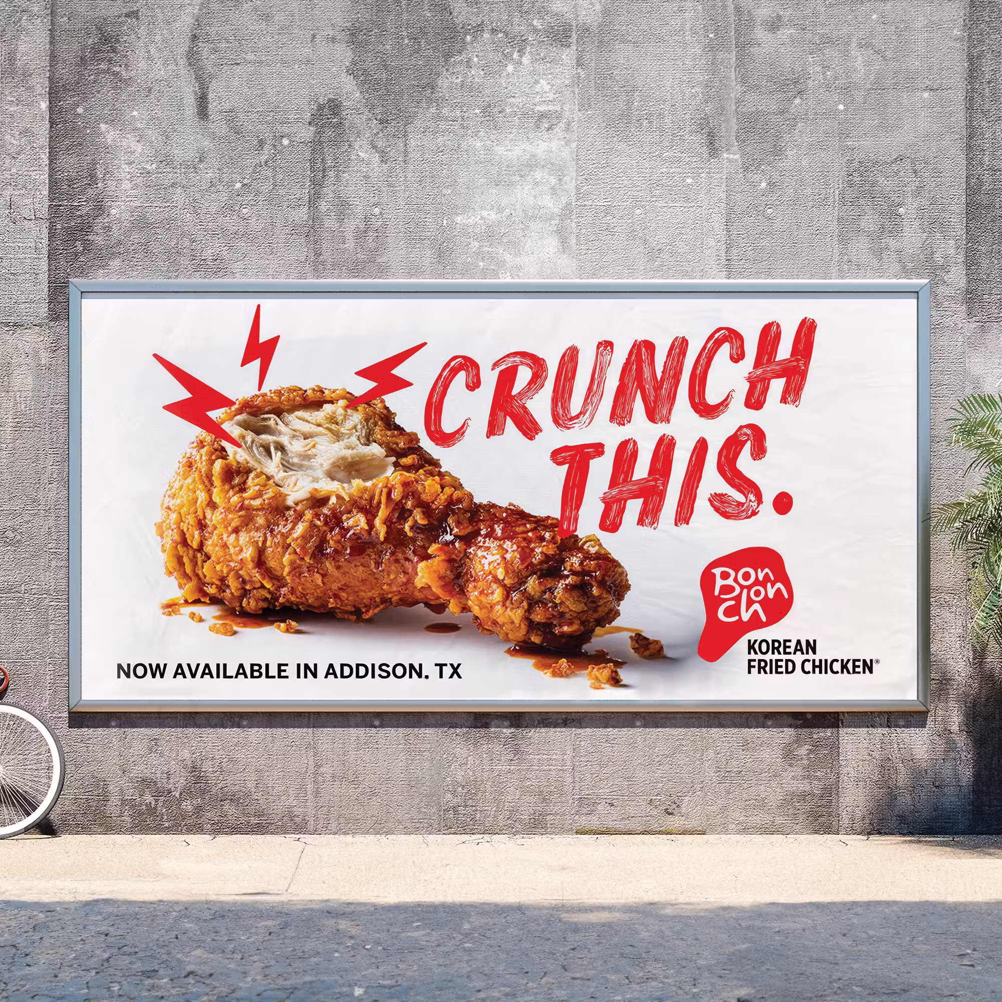 Photo of a BonChon billboard featuring a chicken wing.