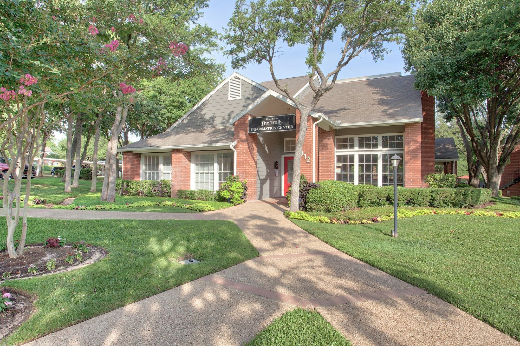 Pathway to apartment at The Trails Apartments in Arlington, Texas