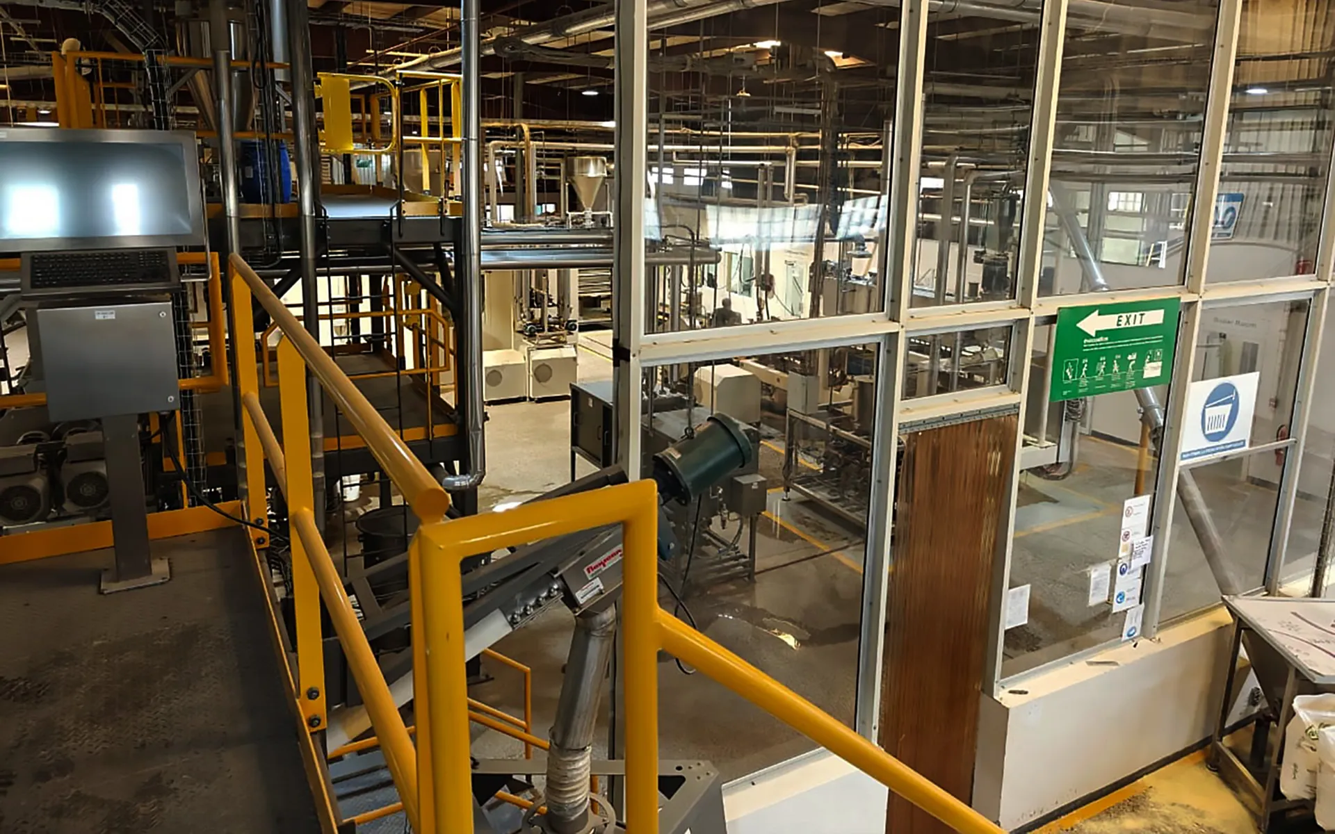 CFM factory control room with monitoring equipment overseeing production operations