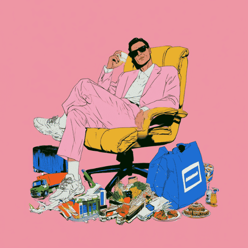 Man in pink suit and sunglasses lounging in yellow chair surrounded by food and blue bag.