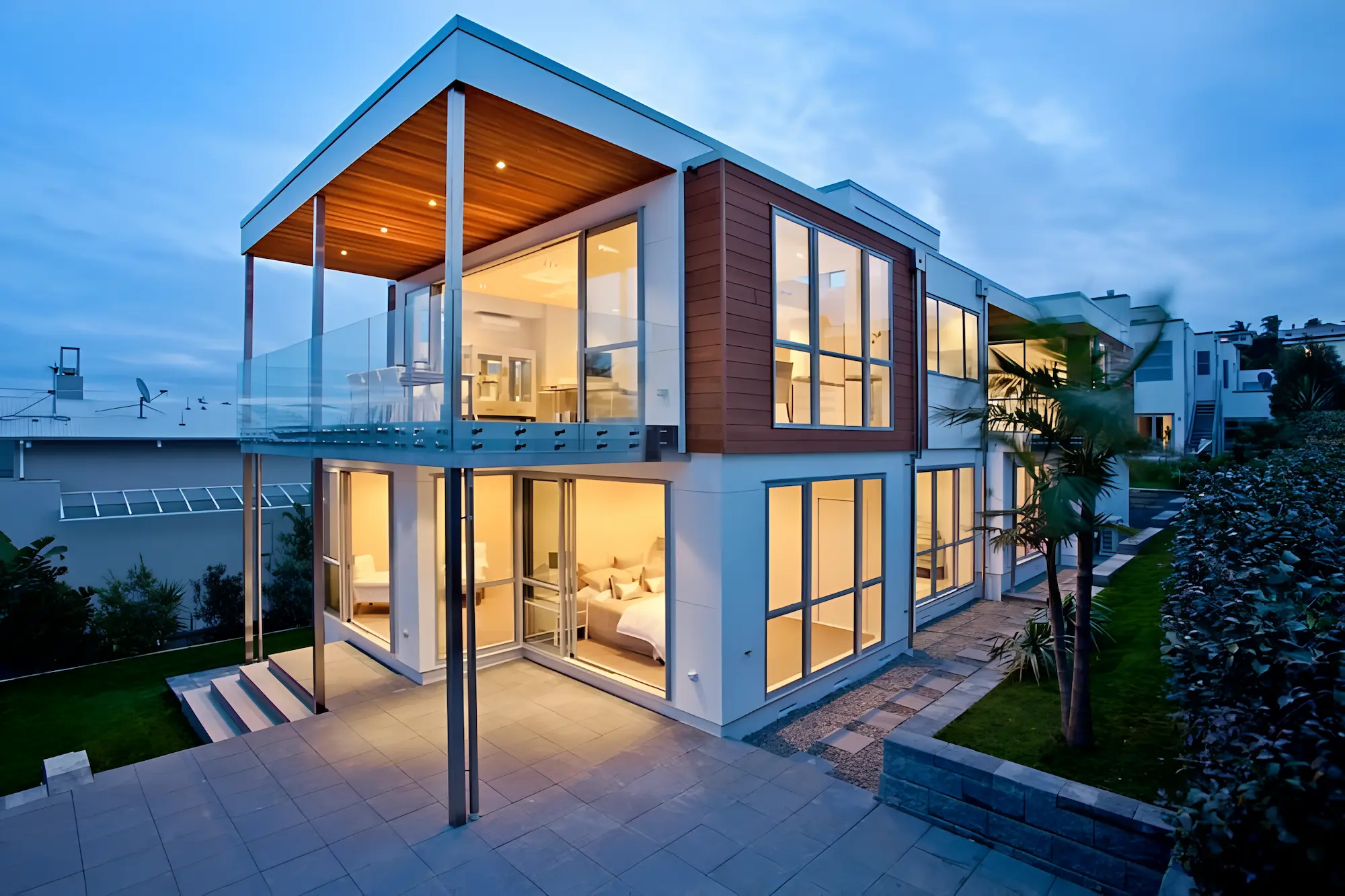 A modern 2 storey building with panoramic windows and geometrical perspective