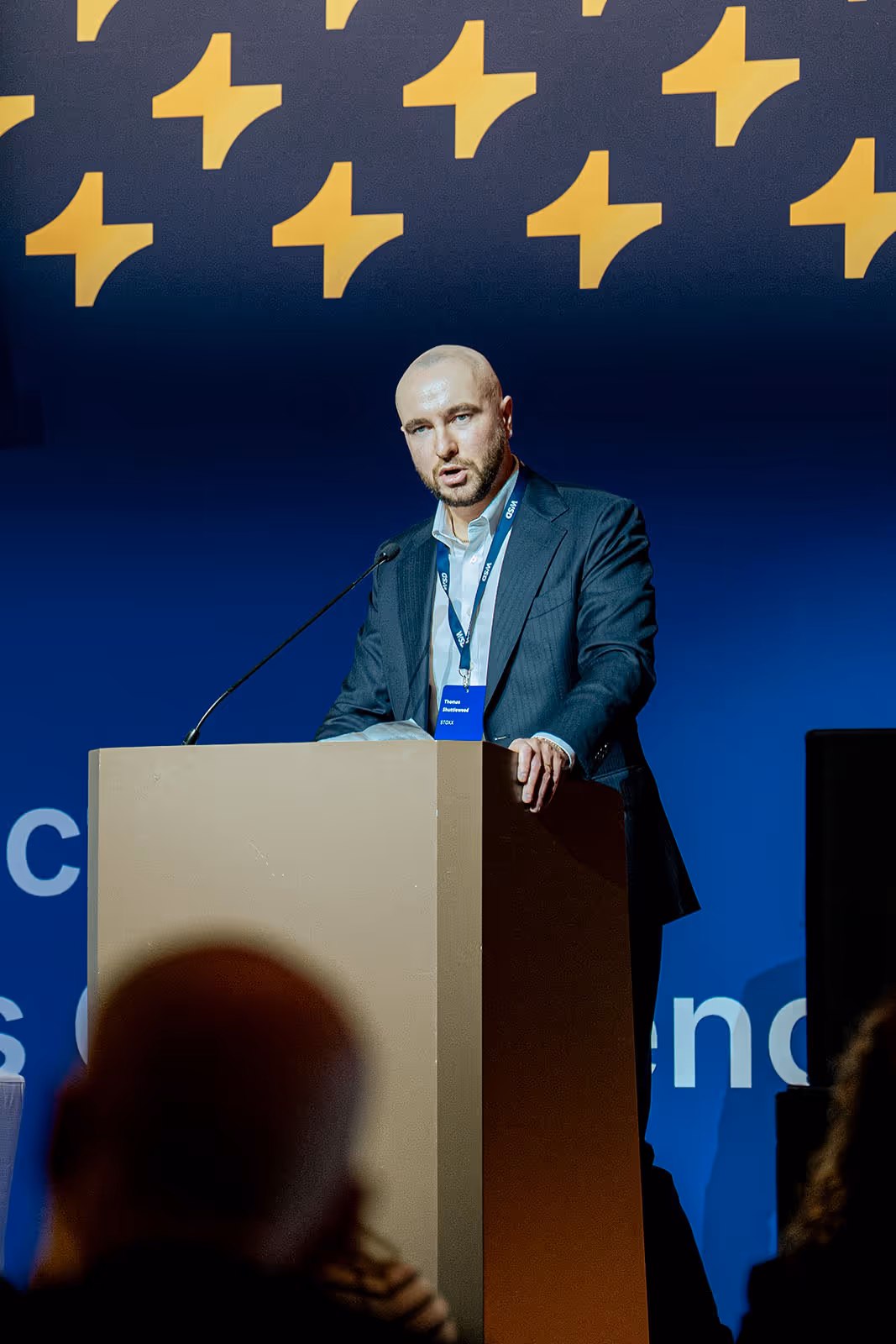 Thomas Shuttlewood, Head of Strategy & Digital Asset Indices, Product Development at STOXX delivering his keynote speech at SPI Europe 2026, the Structured Products Conference.