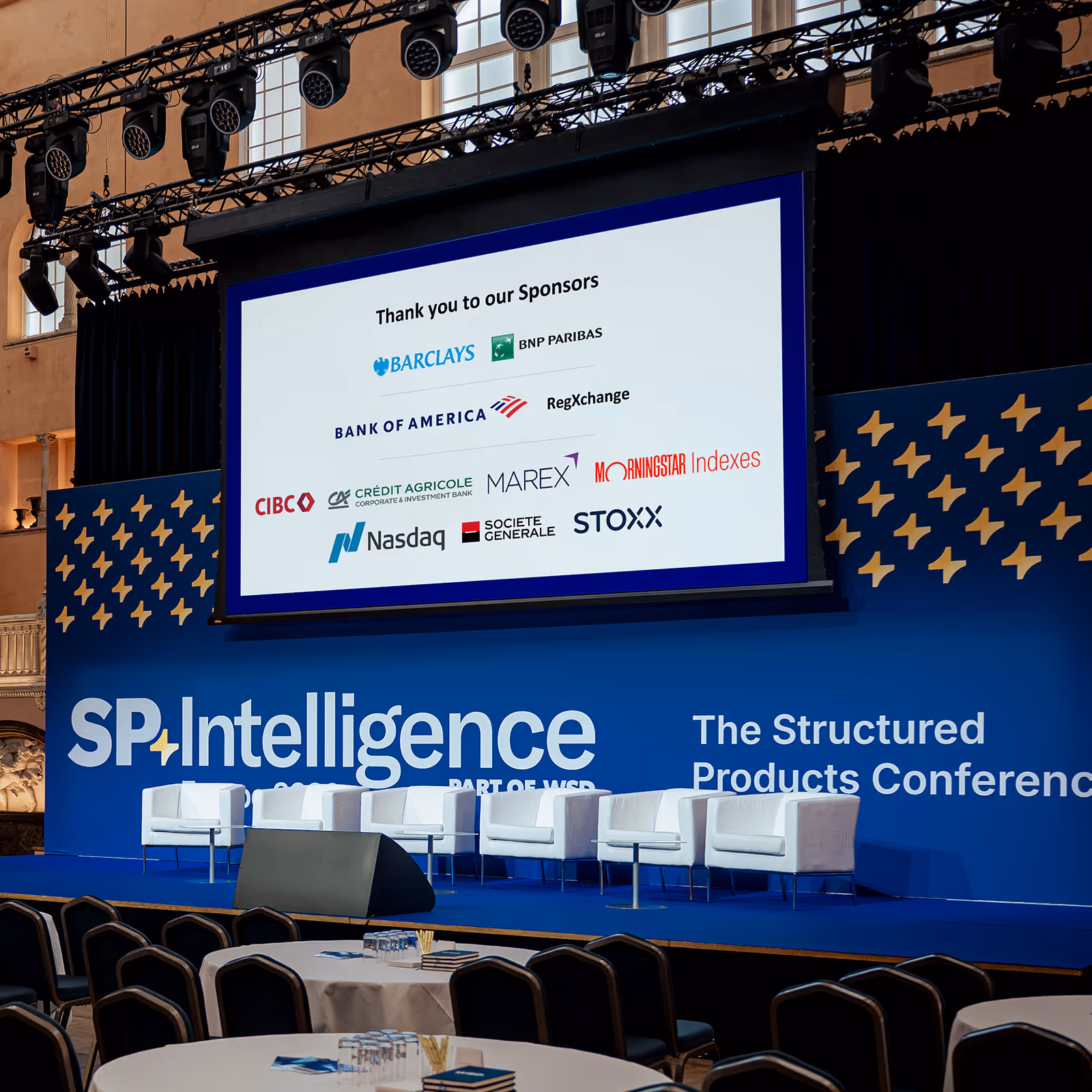 SPI Europe 2026, the Structured Products Conference stage with branding and a screen showing sponsor logos.