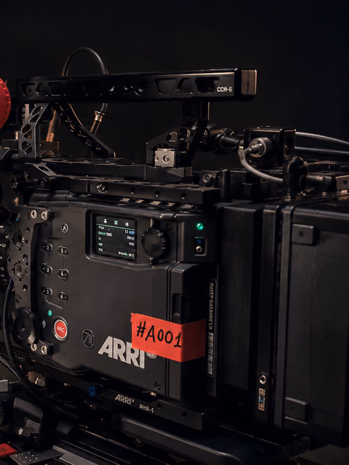 Close-up of an ARRI cinema camera body on a production rig.