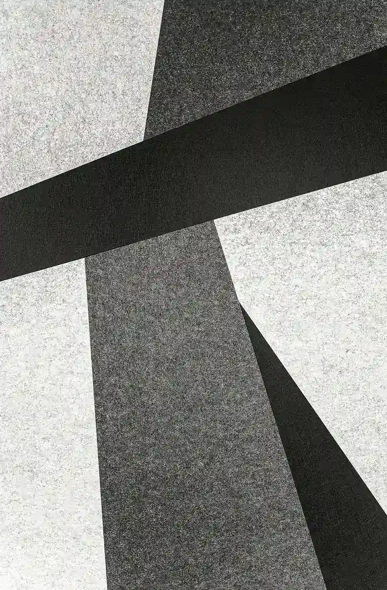Abstract black and gray geometric shapes overlapping on a textured light background.
