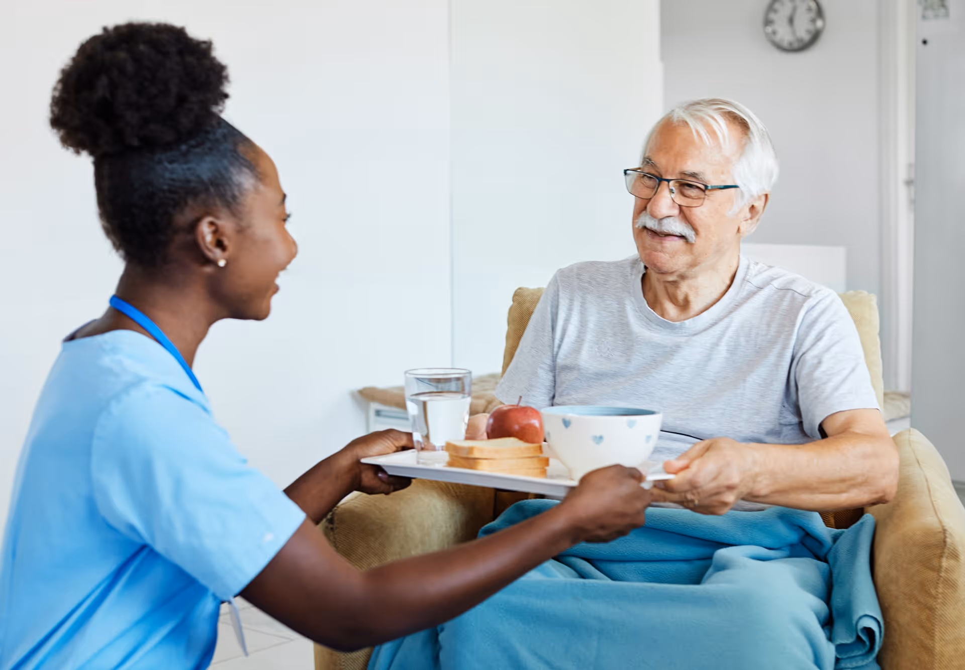 Elderly man with nurse