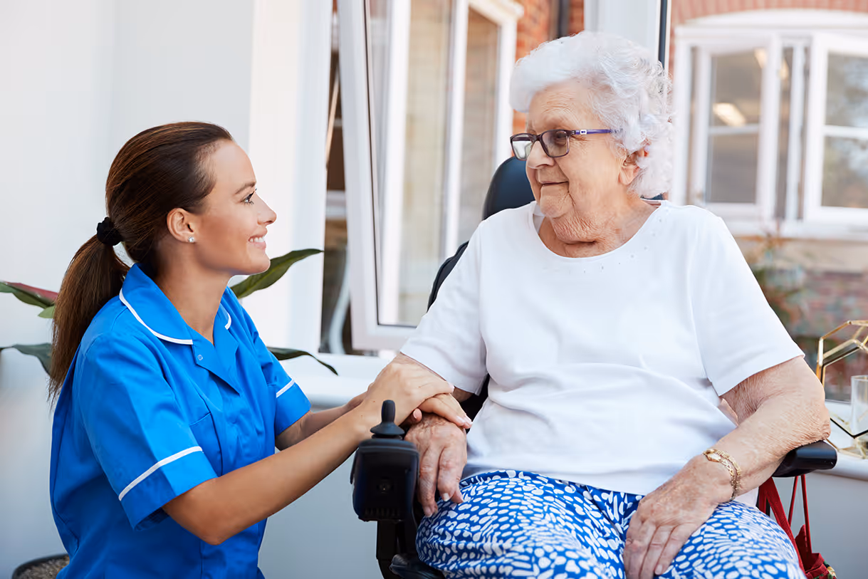 Elderly lady with nurse